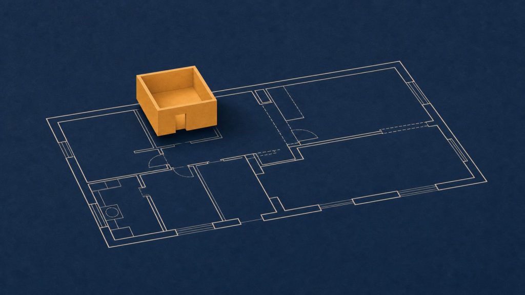 線で描かれた設計図の中で、ひとつの部屋だけが立体の箱になって浮き上がっている